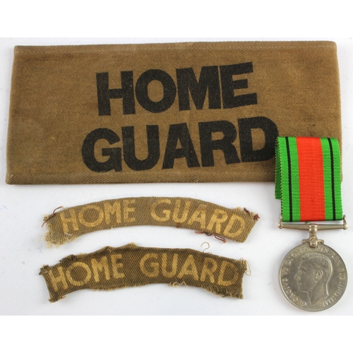 822 - WW2 Home Guard certificate of service to Frank Dodd with his Home Guard arm band and pair of Home Gu... 