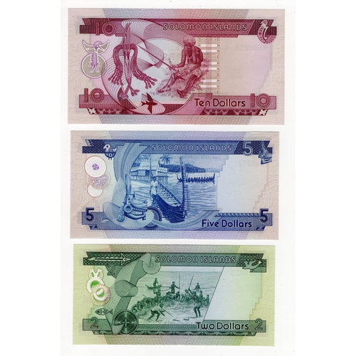 1084 - Solomon Islands (3), 10 Dollars, 5 Dollars and 2 Dollars issued 1977, first series notes with 'A/1' ... 