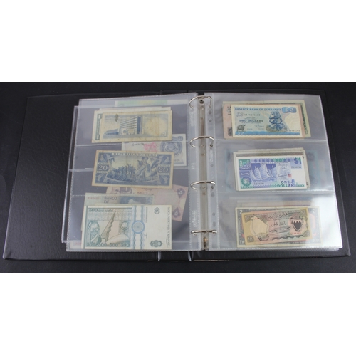 1172 - World (80), collection in album including Lebanon 1 Livre 1939, East African Currency Board 20 Shill... 