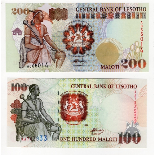 914 - Lesotho (2), 200 Maloti and 100 Maloti dated 1994, serial A065014 & AA783933 (BNB B217a, B215a, Pick... 