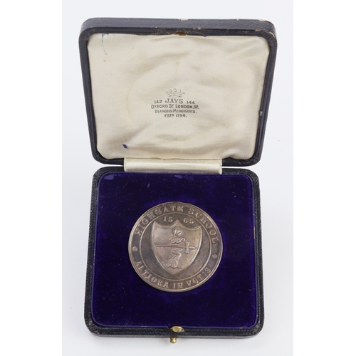 1102 - British School Sports Medal, unmarked silver d.43.5mm, 46.57g: Highgate School / Quarter Mile Under ... 