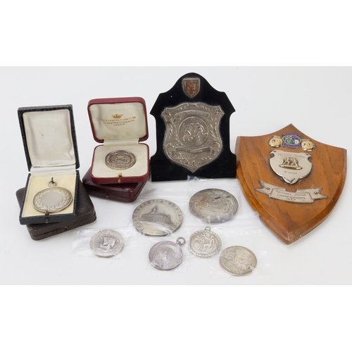 1107 - British Sporting Medals & Plaques (12) hallmarked or 'sterling' marked silver, including football-re... 