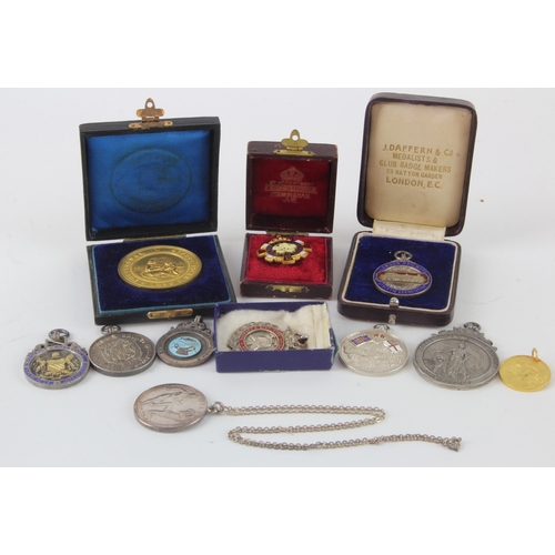 1113 - British sports and other fobs, badges and medals (11) 19th-20thC mostly silver, interesting types.