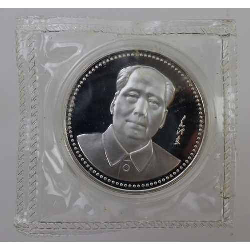 1117 - China, Chairman Mao white metal crown-size medal in capsule and packaging.