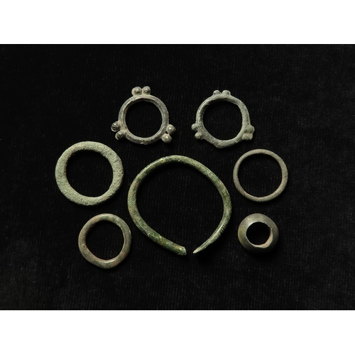 345 - Celtic Britain: Six pieces of bronze ring money, various types including multi-knotted, plus a small... 