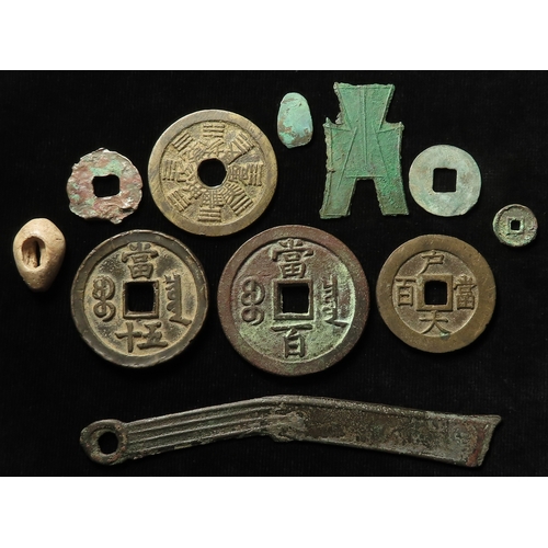 656 - China (11) ancient to 19thC(?) currency, coins and charms.