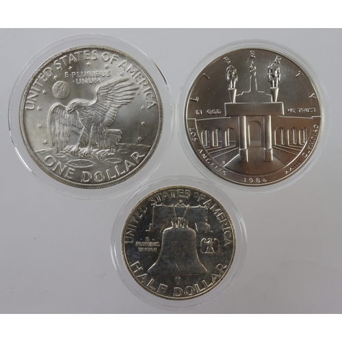 976 - USA (3): Silver Half Dollar 1962 UNC, silver-clad Moon Dollar 1972 BU, and Los Angeles Olympics silv... 