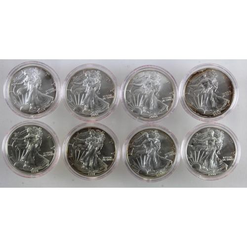 998 - USA Walking Liberty Dollars (8) a date run from 1997 - 2004. BU in hard plastic capsules, some coins... 