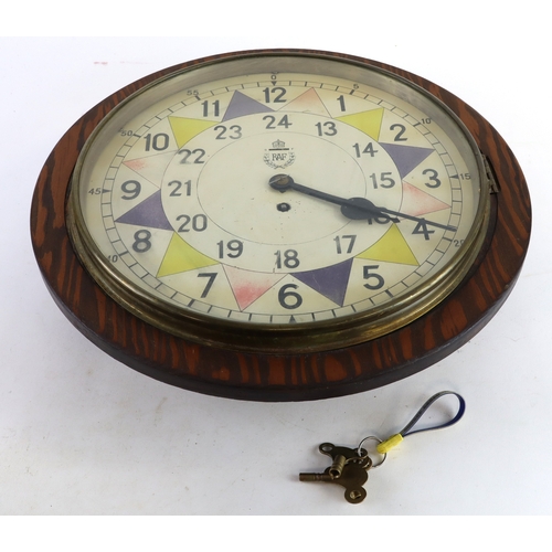 227 - RAF Sectional wall clock, wood stamped to the reverse 'SMITH 1943' and CROWN over 'GRVI'. With keys.... 