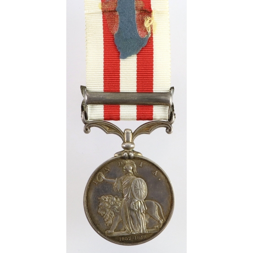 534 - Indian Mutiny Medal with Delhi clasp named (John Bridges, 1st Bn 8th Regt). The Kings. Died 18th Sep... 