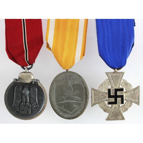 668 - German 3rd Reich Eastern front, Atlantic wall and service cross medals.