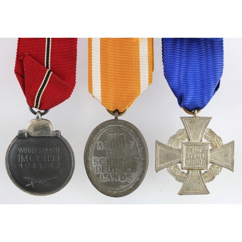 668 - German 3rd Reich Eastern front, Atlantic wall and service cross medals.