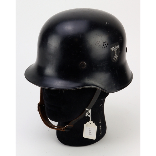 838 - German scarce WW2 TENO single decal black panted steel helmet.