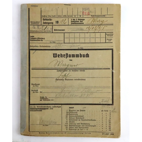 841 - German soldiers Wehrftammbuch service record book to Oberst Karl Wintergerst Artillery -Regiment 79.