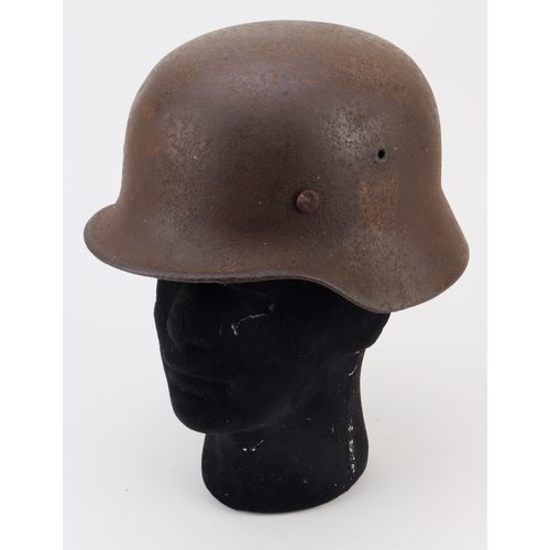 938 - German WW2 steel helmet with traces of decal.