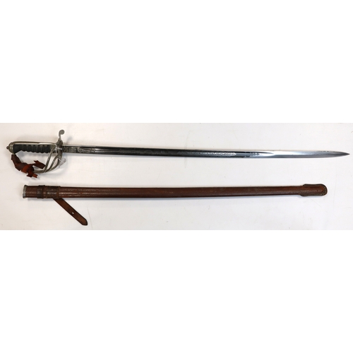 967 - Sword ERII 1850 pattern artillery officers made by Wilkinson no 77662 in its brown leather field sca... 