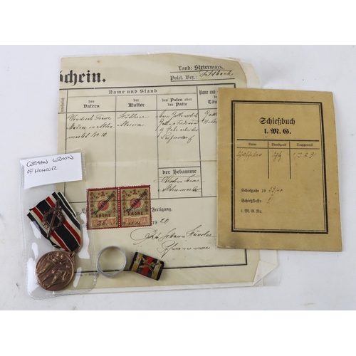 973 - WW1 imperial German documents, German legion of honour medal, trench art ring.