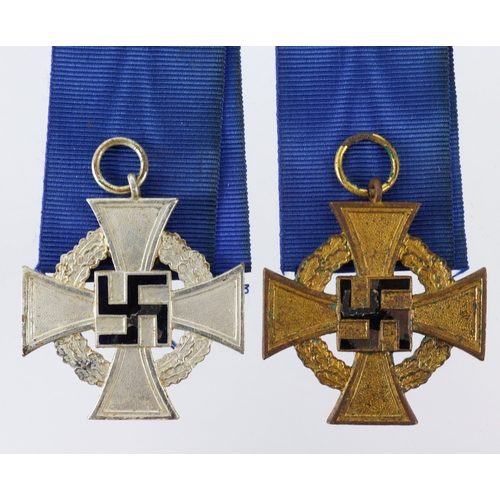 725 - German Faithful Service medals silver grade 25 years and golden.