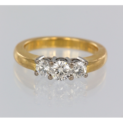 109 - 18ct yellow gold diamond trilogy ring, three graduated round brilliant cuts, known diamond weight 0.... 