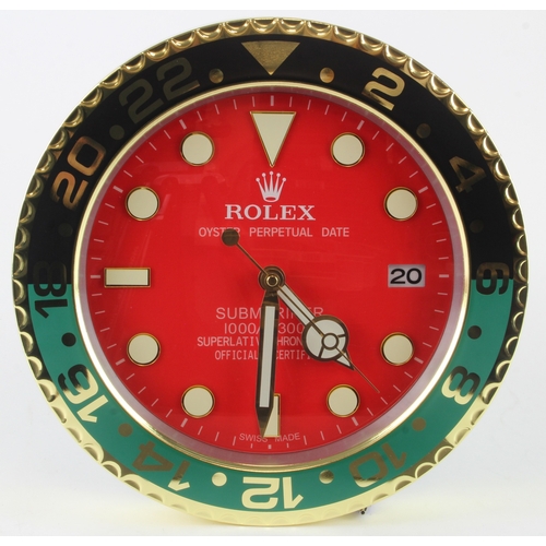 621 - Advertising Wall Clock. Black & Green surround 'Rolex' style advertising wall clock, red dial reads ... 