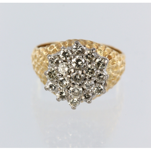 66 - Yellow metal (stamped 18ct) diamond cluster ring, nineteen round brilliant cuts, total diamond weigh... 