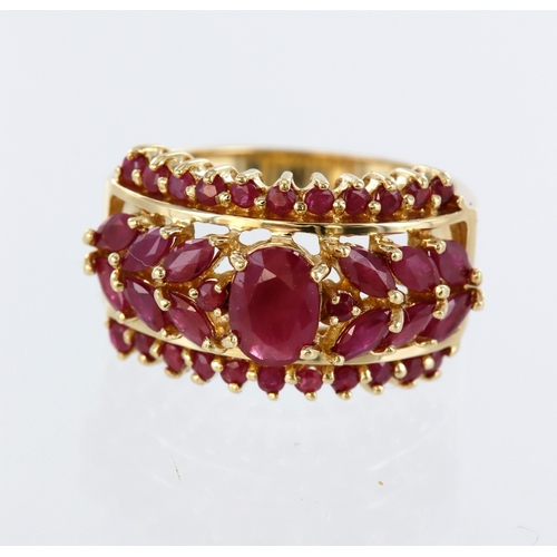 70 - Yellow metal (stamped 14ct) ruby dress ring, finger size N/O, weight 6.0g