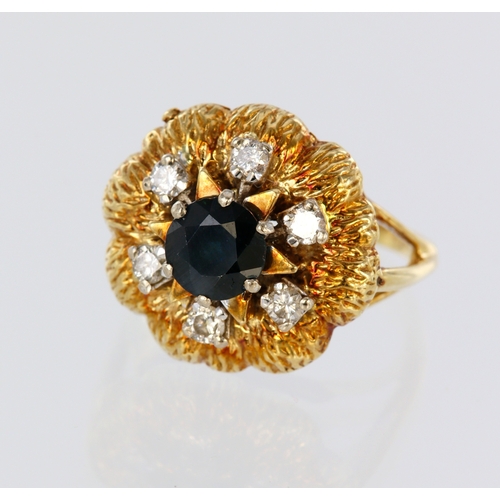 72 - Yellow metal (tests 18ct) sapphire and diamond fancy cluster ring, centre round sapphire approx. 7mm... 