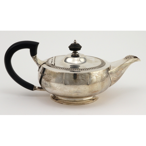 745 - Silver teapot, hallmarked 'GH, Sheffield 1919, engraved inscription to base, length 24cm approx., to... 