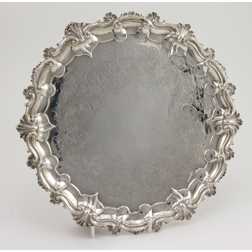 765 - Victorian silver ornately decorated tray, raised on three feet, hallmarked 'EEJWB, London 1844' (Edw... 