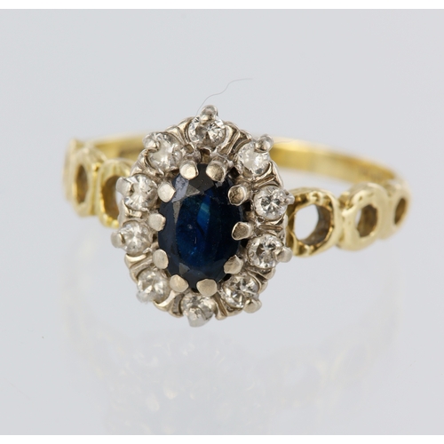 79 - 18ct yellow gold sapphire and diamond cluster ring, centre oval sapphire 6mm x 4mm, ten round brilli... 