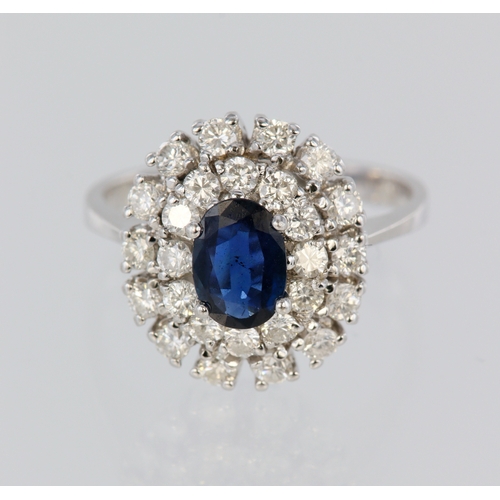 80 - White metal (tests 18ct) sapphire and diamond cluster ring, central oval sapphire 7mm x 5mm, surroun... 