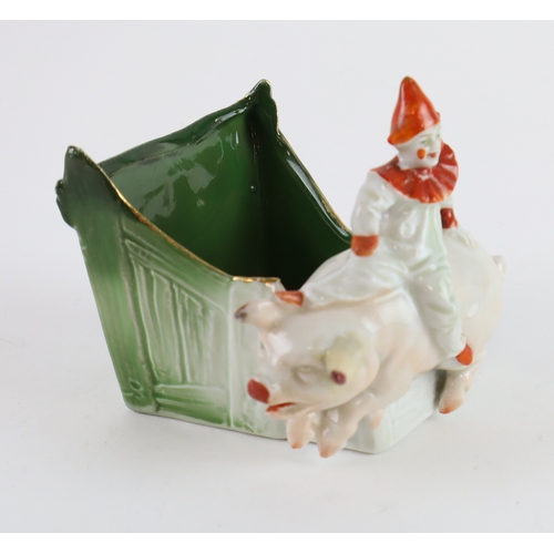 127 - Three pig related German (probably) china Fairings comprising a clown on a pig (pig has a restored e... 