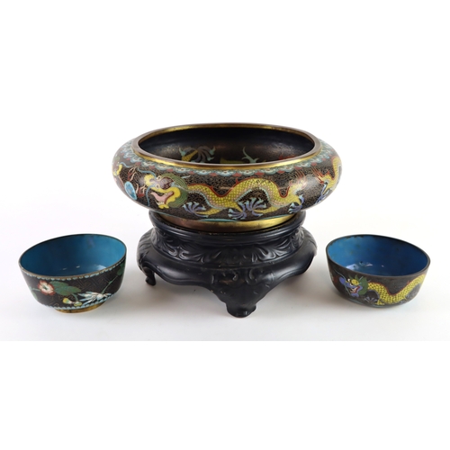 53 - Cloisonne. A large chinese cloisonne bowl with dragon decoration, Chinese characters to base, height... 