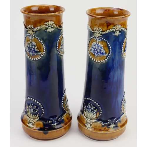 66 - Doulton Lambeth pair of glazed stoneware vases (6699), makers marks to base, height 25.5cm