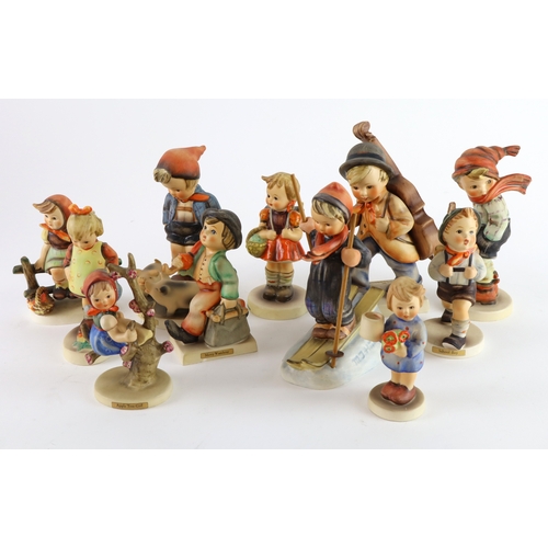 76 - Hummel. A collection of eleven Goebel Hummel figures, makers mark to base of each, tallest 13cm appr... 