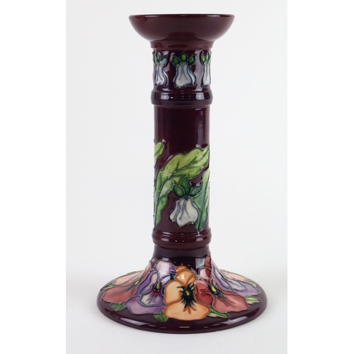 90 - Moorcroft Pansy pattern candlestick, makers marks to base, height 20.5cm approx.