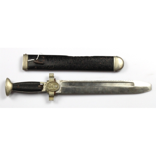 66 - German 3rd Reich Red Cross Man's Dagger with metal scabbard. Grips damaged on both sides. Scabbard w... 