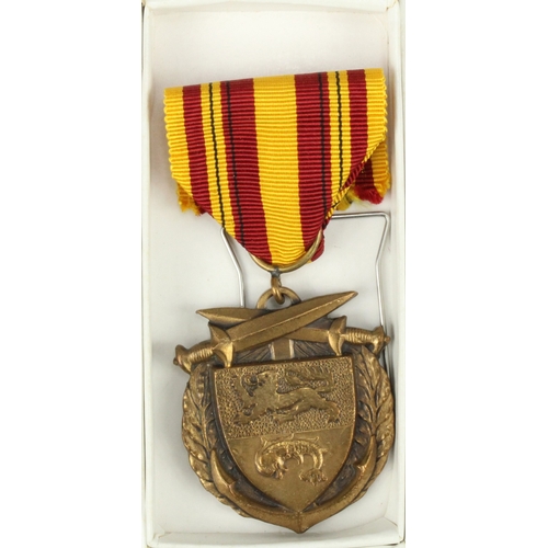 682 - Dunkirk 50th Anniversary Commemorative medal in original box with award slip to G L White.