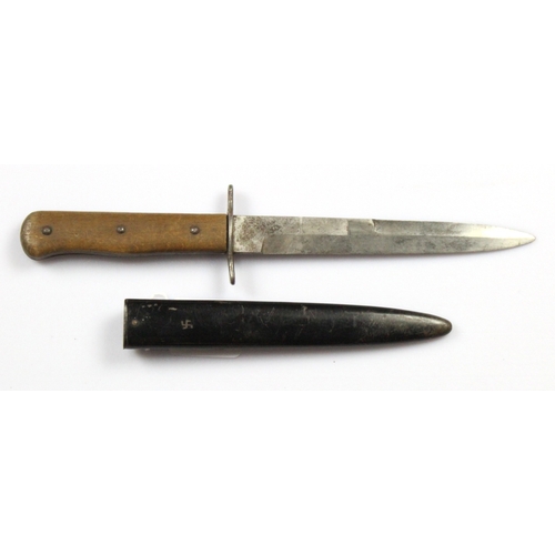 69 - German Boot Knife with original steel scabbard. Piece of wooden grip missing to one side. Blade mark... 