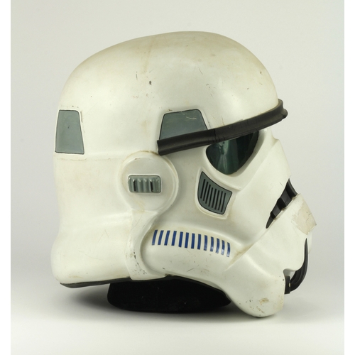 360 - Star Wars interest. A Star Wars Stormtrooper helmet, from Elstree studios, the white painted helmet ... 