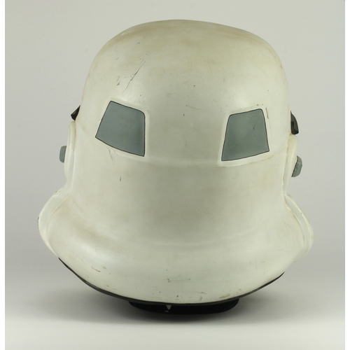 360 - Star Wars interest. A Star Wars Stormtrooper helmet, from Elstree studios, the white painted helmet ... 