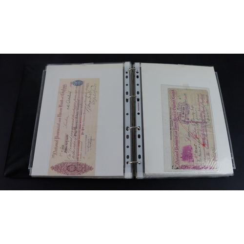 16 - Cheques & Ephemera (65), a collection in an album, cheques including Capital & Counties Bank, Co-ope... 