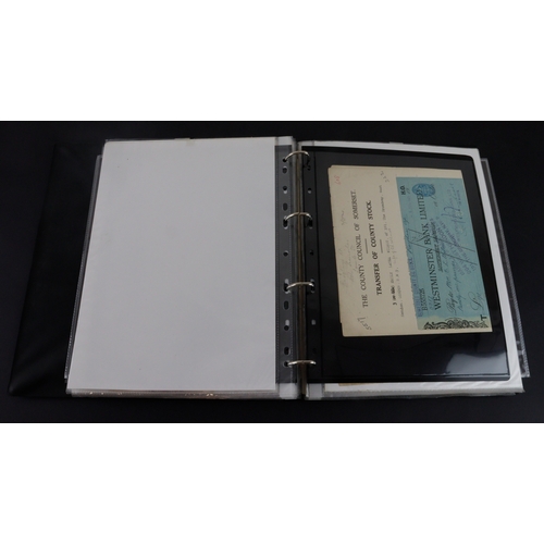 16 - Cheques & Ephemera (65), a collection in an album, cheques including Capital & Counties Bank, Co-ope... 