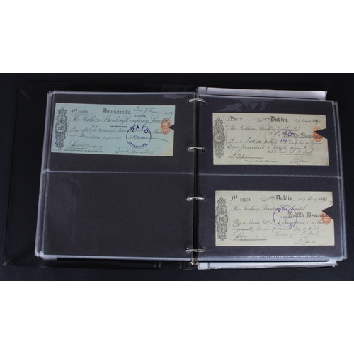 21 - Cheques (177), a collection of mainly Irish cheques in an album, the majority being Northern Banking... 