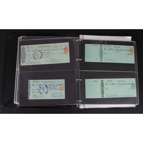 21 - Cheques (177), a collection of mainly Irish cheques in an album, the majority being Northern Banking... 