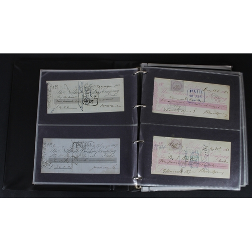 21 - Cheques (177), a collection of mainly Irish cheques in an album, the majority being Northern Banking... 