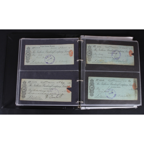 21 - Cheques (177), a collection of mainly Irish cheques in an album, the majority being Northern Banking... 