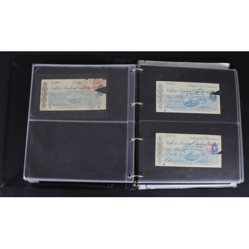 21 - Cheques (177), a collection of mainly Irish cheques in an album, the majority being Northern Banking... 