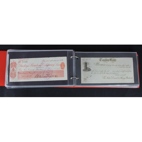 22 - Cheques (189), a collection in an album, including Bank of England, Barclays Bank, Bradford Old Bank... 
