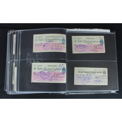 23 - Cheques (219), a collection of Belfast Banking Company cheques in an album, date range 1830 - 1970, ... 
